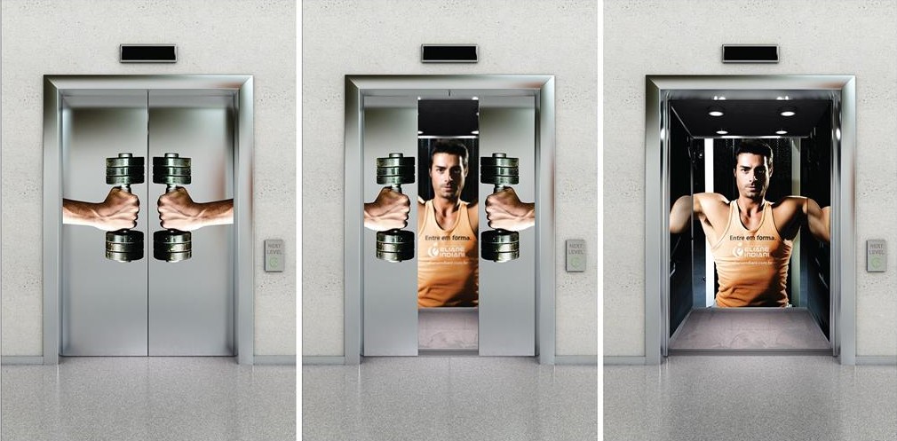 креативная реклама в лифте спортзал